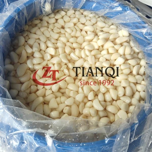 Консервированный чеснок в рассоле в бочках